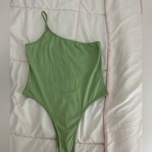 Green one shoulder bodysuit